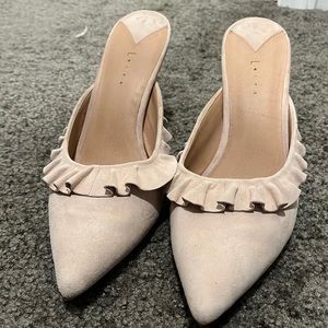 Nude high heeled slip on mules